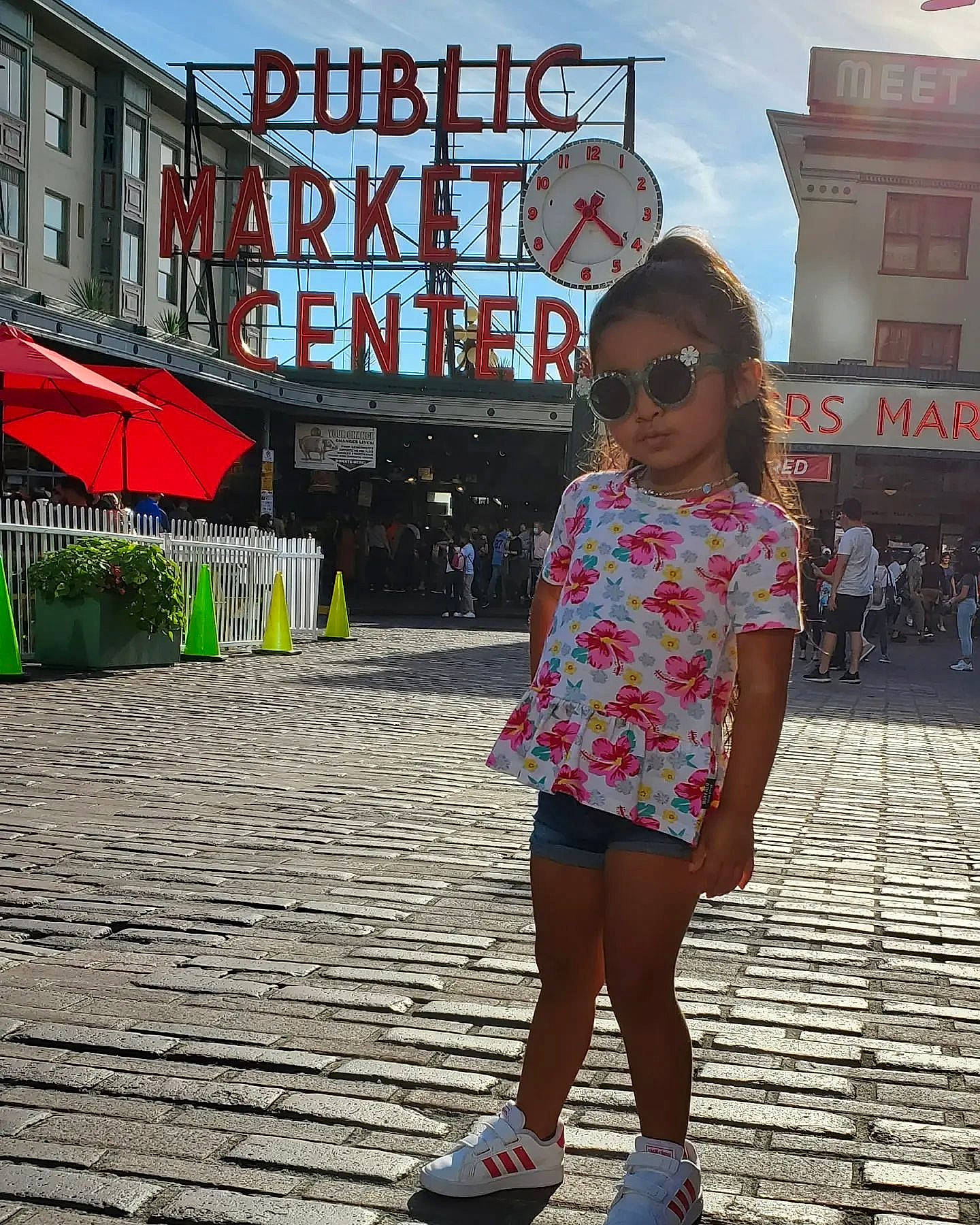 Saige is registered to the contest to win money with this photo: asphalt, cool, eyewear, footwear, goggles, infrastructure, leisure, line, person, public_space, road_surface, shoe, sidewalk, sky, sleeve, street_fashion, sunglasses, thigh, travel, vision_care