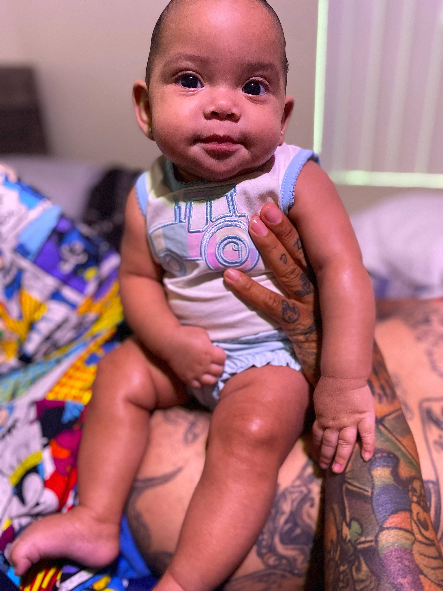 Jazara is registered to the contest to win money with this photo: baby, baby_toddler_clothing, black, cheek, chin, face, happy, human, iris, joint, lip, mouth, muscle, nose, organ, people, person, pink, skin, thigh