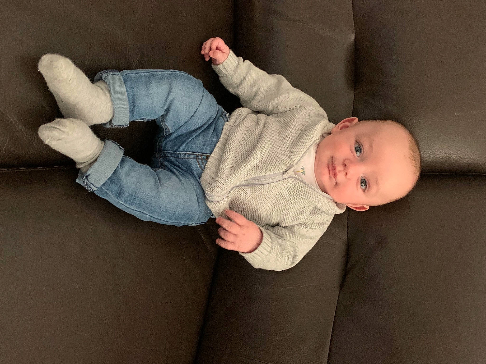 Soan participe au concours pour gagner de l'argent avec cette photo : baby, baby_products, baby_toddler_clothing, cheek, child, comfort, eye, gesture, linens, mammal, nail, person, product, room, sitting, skin, sleeve, thumb, toddler, tree