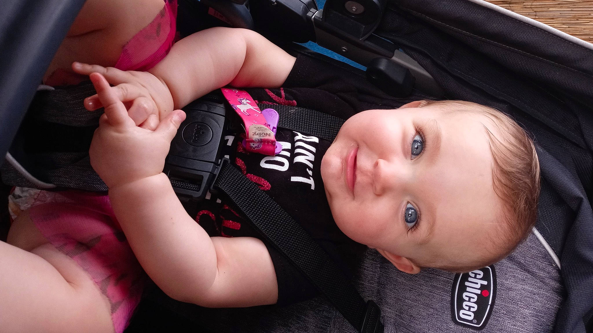 Aria is registered to the contest to win money with this photo: auto_part, baby, baby_carriage, baby_toddler_clothing, beauty, car_seat, child, finger, flash_photography, fun, gesture, lip, mouth, nail, person, plant, skin, smile, thumb, toddler