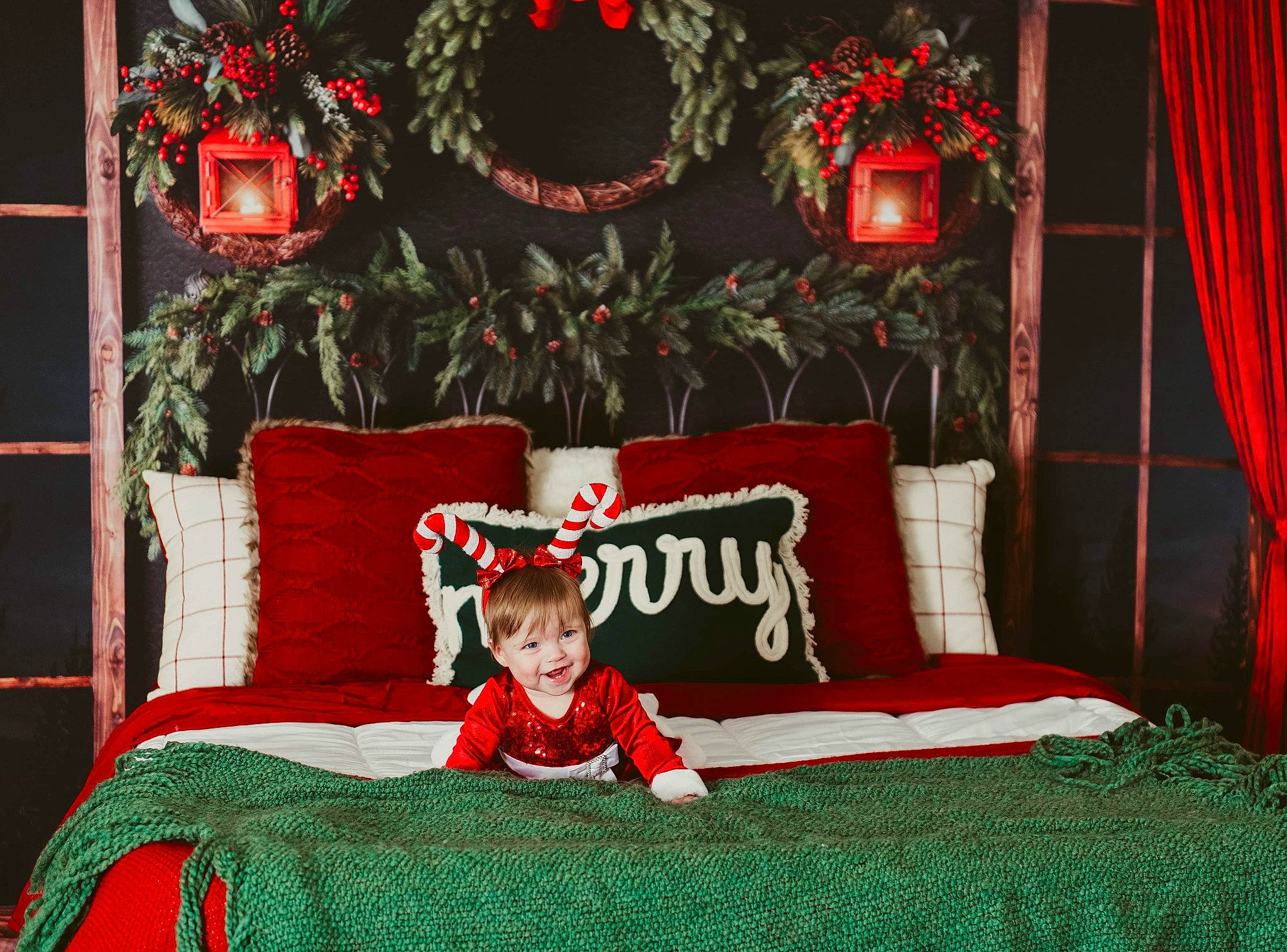 Rory is registered to the contest to win money with this photo: christmas, christmas_decoration, christmas_eve, comfort, curtain, decoration, event, holiday, home, joy, linens, ornament, pattern, person, plant, rectangle, red, room, textile, toddler