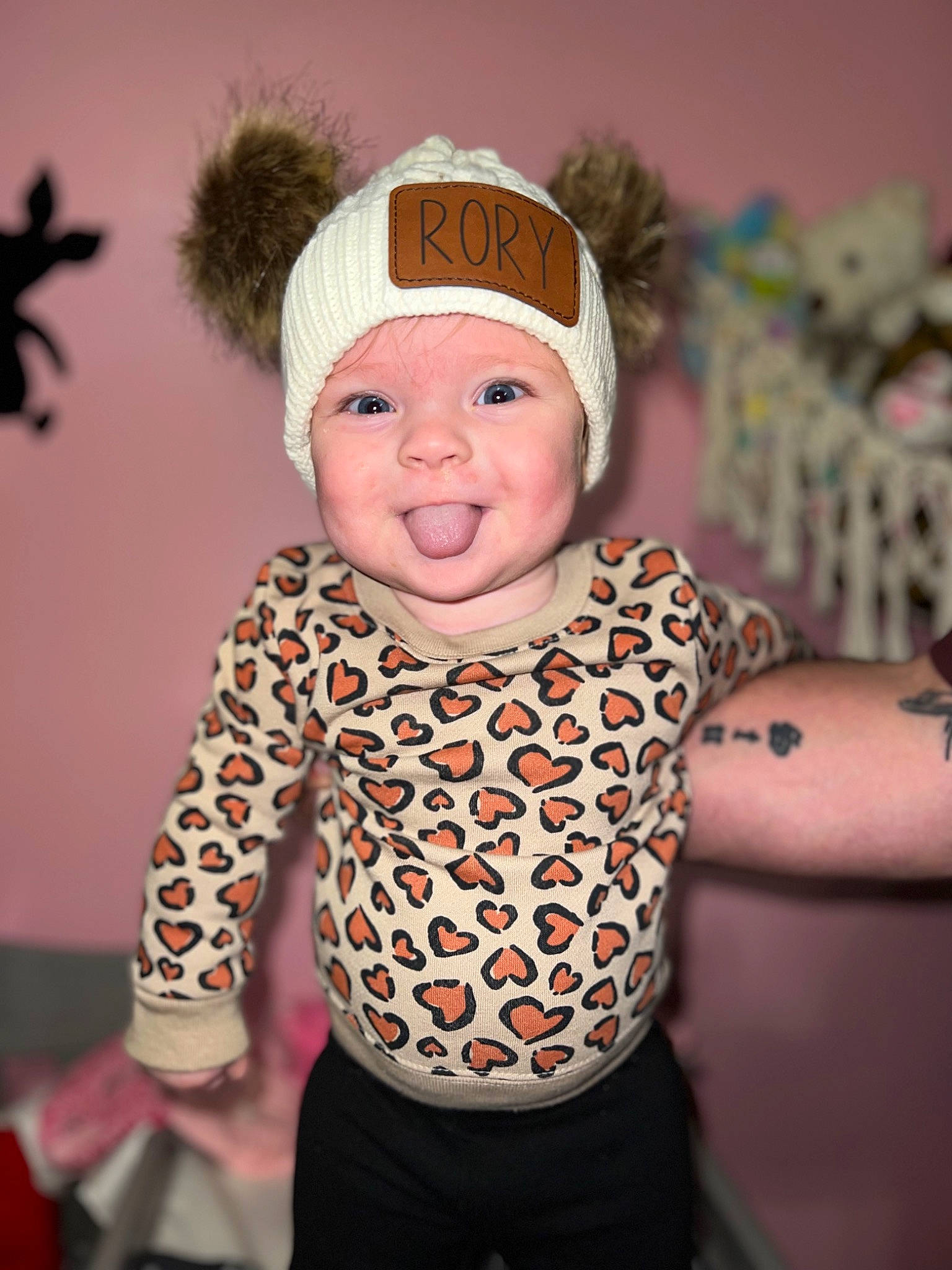 Rory is registered to the contest to win money with this photo: baby, baby_toddler_clothing, cap, child, costume_hat, event, fashion_accessory, fun, happy, headband, headgear, headpiece, headwear, jewellery, pattern, person, pink, sleeve, smile, textile
