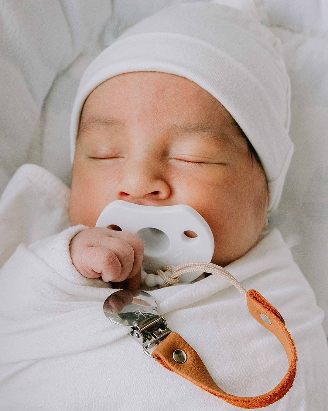 Atlas is registered to the contest to win money with this photo: baby, baby_products, baby_sleeping, baby_toddler_clothing, cheek, child, comfort, drinkware, eye, eyelash, finger, hand, head, headwear, mouth, nose, person, product, service, skin
