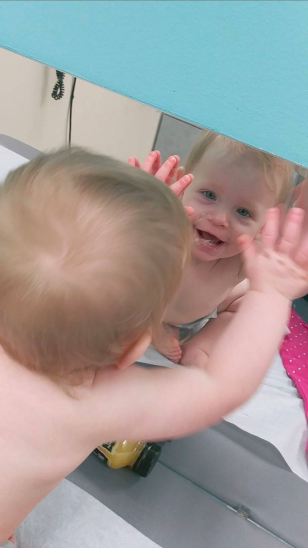 Emilee is registered to the contest to win money with this photo: baby, bathing, child, ear, finger, hand, head, neck, person, skin, toddler