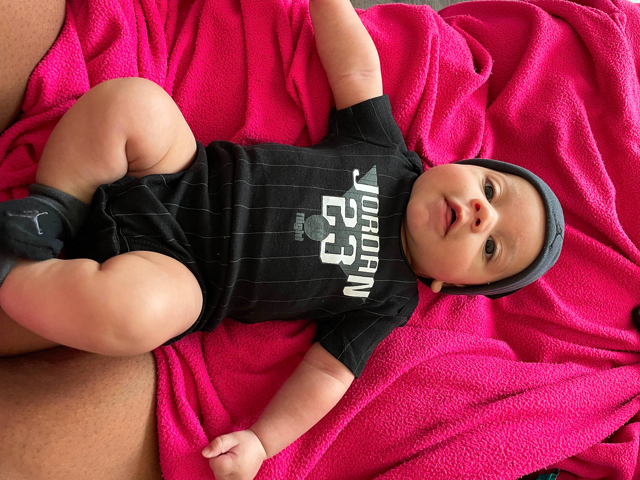 Tye is registered to the contest to win money with this photo: arm, black_hair, comfort, cool, elbow, finger, glasses, hand, human_body, joint, knee, leg, lip, person, pink, shoulder, sleeve, textile, thigh, trunk