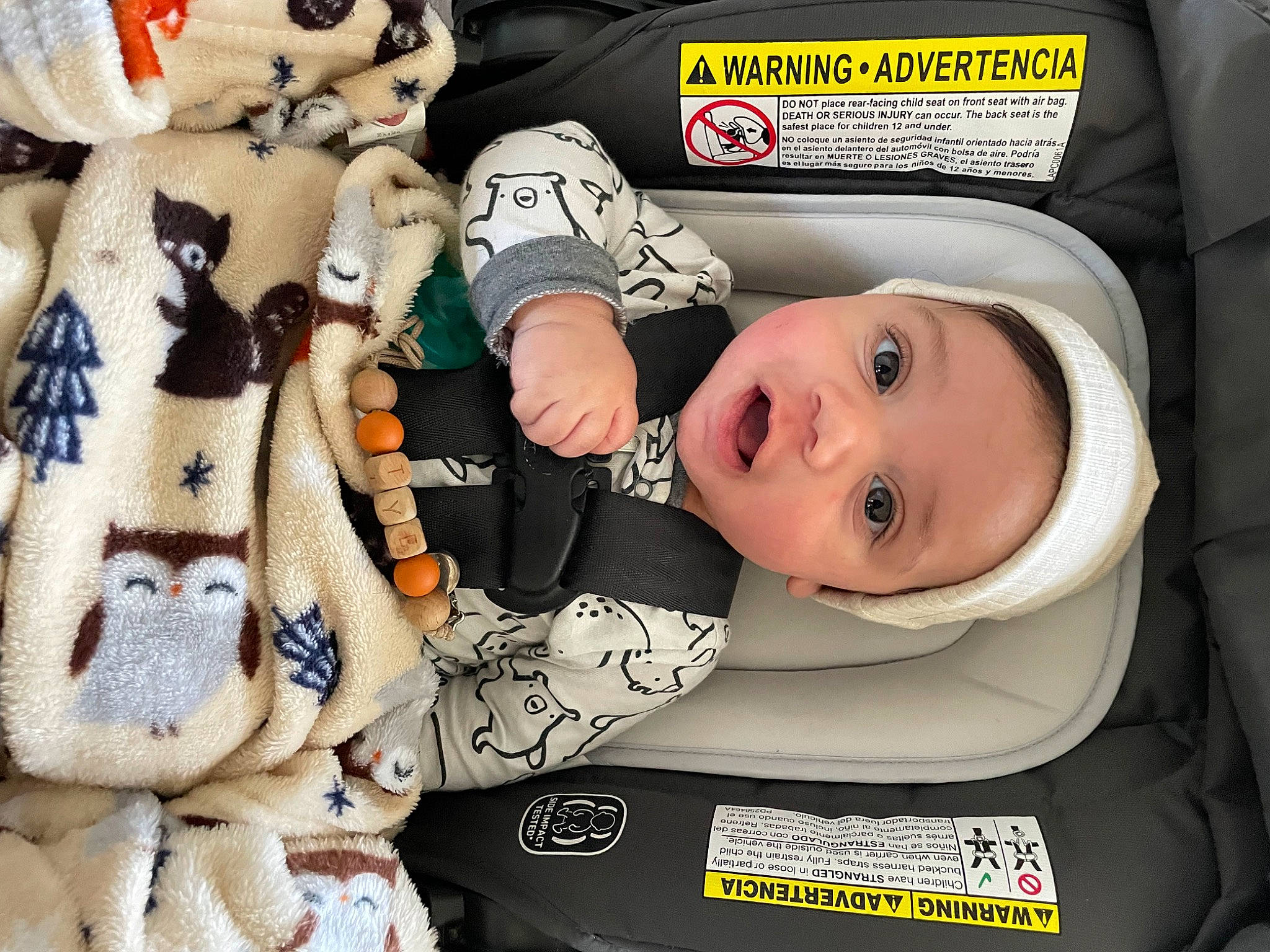 Tye joined the competition — help win amazing prizes! baby, baby_carriage, baby_products, baby_safety, baby_toddler_clothing, car_seat, carmine, child, comfort, fashion_accessory, font, fur, headwear, linens, pattern, person, product, room, smile, stuffed_toy