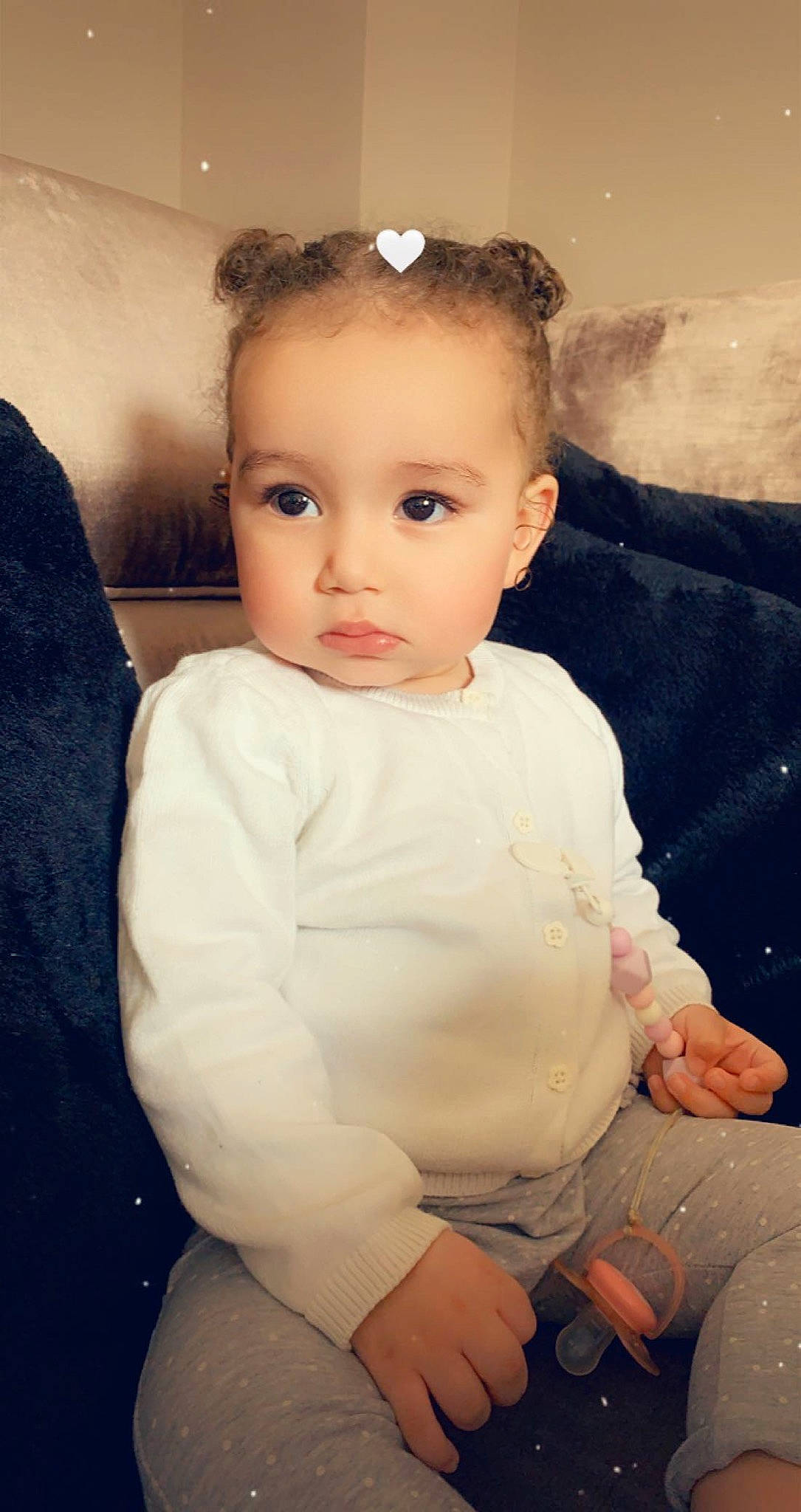 Ilyana participe au concours pour gagner de l'argent avec cette photo : baby_toddler_clothing, cheek, child, chin, comfort, dress, eye, facial_expression, flash_photography, hairstyle, happy, headgear, iris, lip, neck, person, shoulder, skin, sleeve, standing