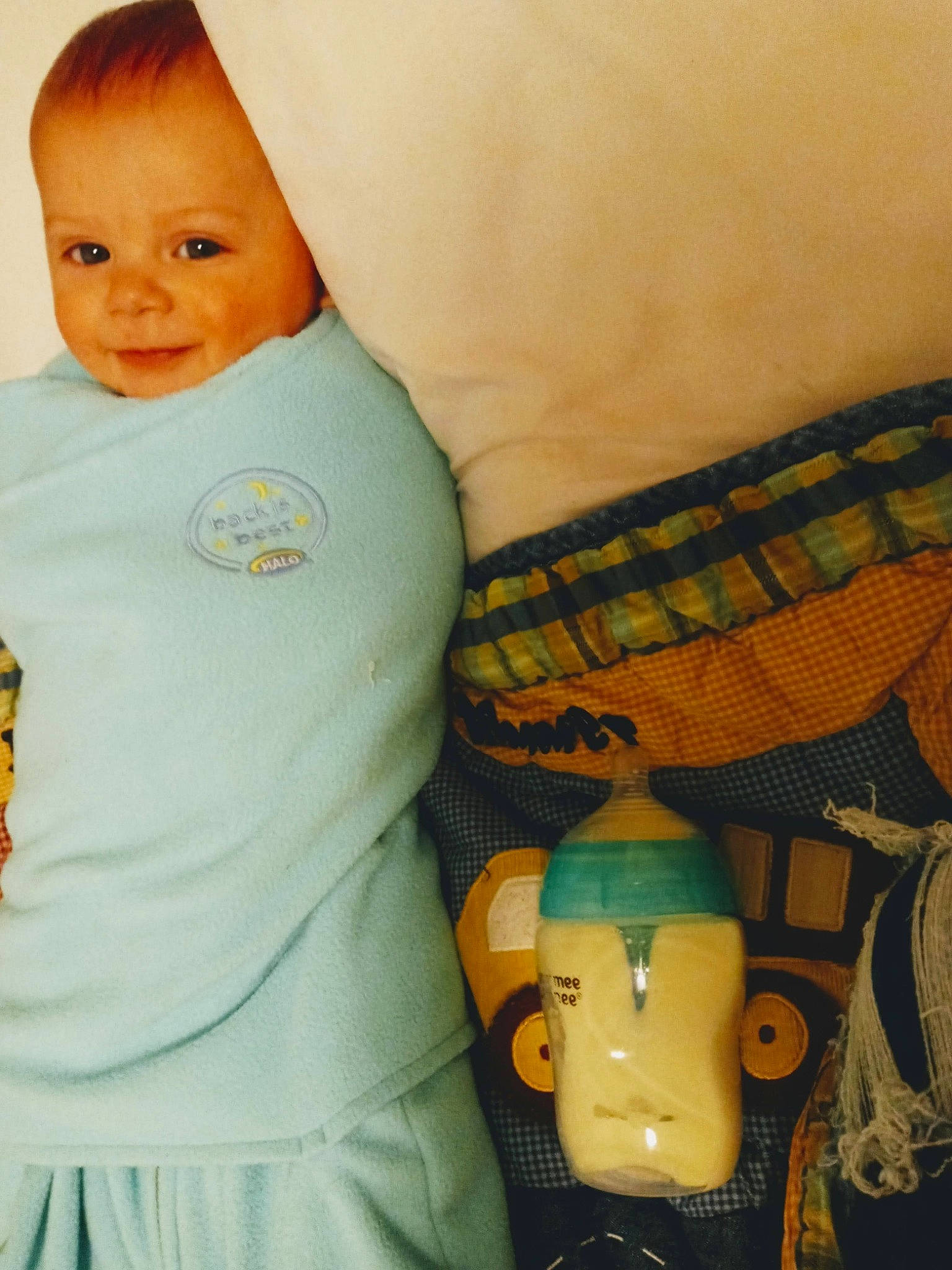 Myles is registered to the contest to win money with this photo: arm, baby_toddler_clothing, cheek, eye, finger, gesture, happy, headgear, joint, mammal, mouth, muscle, neck, nose, organ, person, shoulder, skin, sleeve, textile