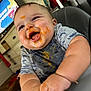 baby, child, messy_face, food, high_chair, happy, smiling, indoor, furniture, television, clothing, toddler, cute, playful, home, portrait, expression, chubby_cheeks, hands, casual