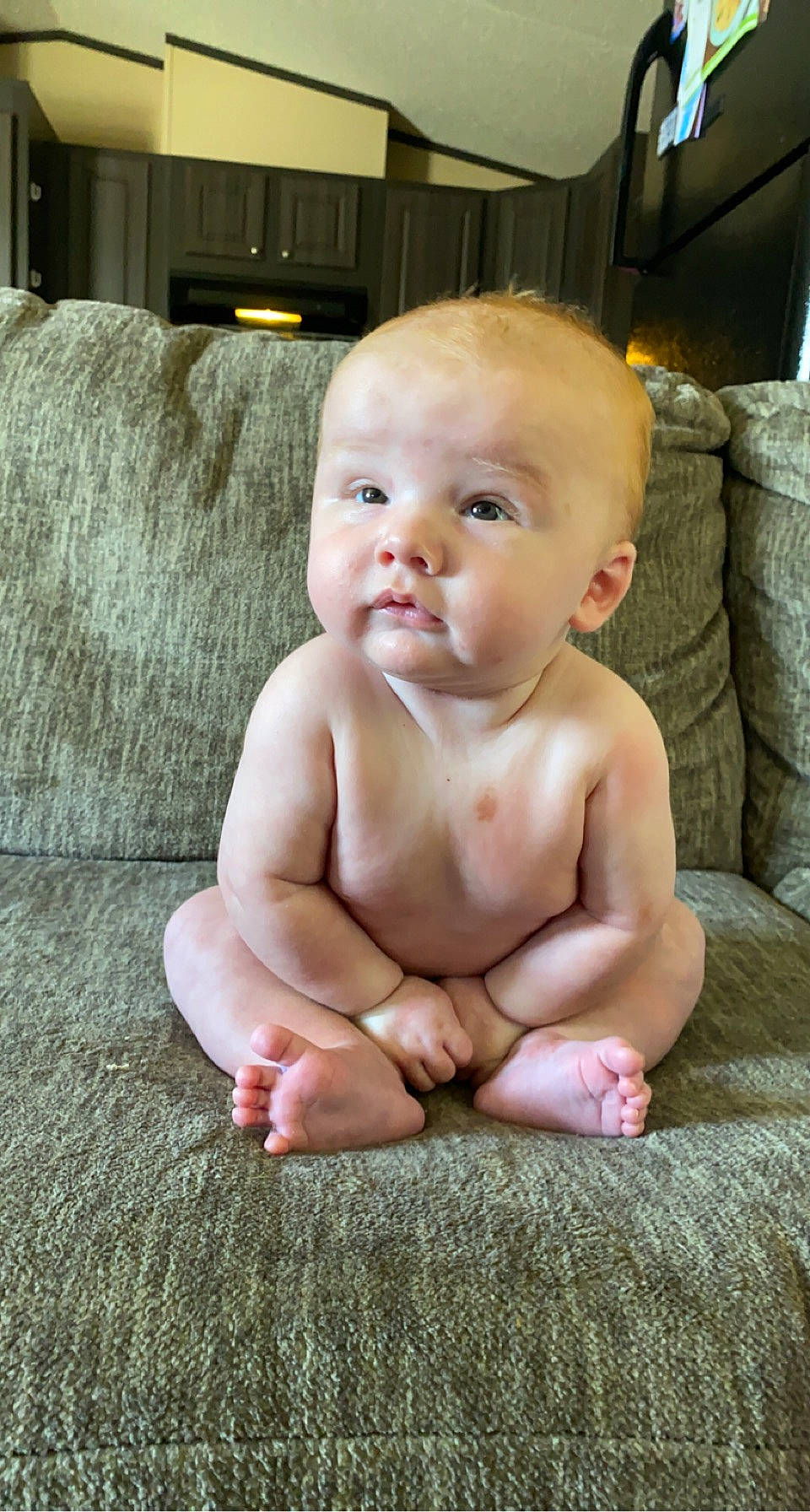 Declan joined the competition — help win amazing prizes! baby, baby_toddler_clothing, barefoot, blond, cheek, chest, child, chin, comfort, eye, floor, flooring, foot, grass, human_leg, iris, lip, person, sitting, skin