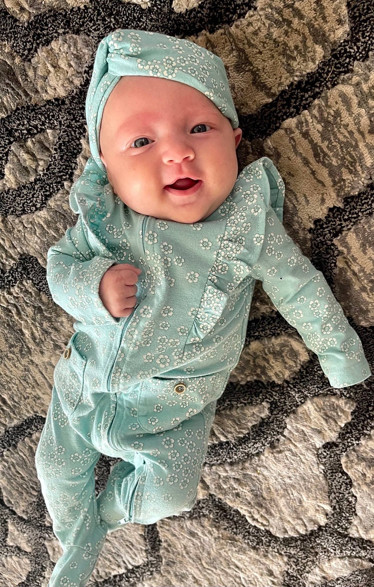 Lula is registered to the contest to win money with this photo: baby, baby_toddler_clothing, cap, child, cool, eye, face, facial_expression, grass, hairstyle, happy, head, headwear, human_body, iris, lip, organ, people_in_nature, person, skin