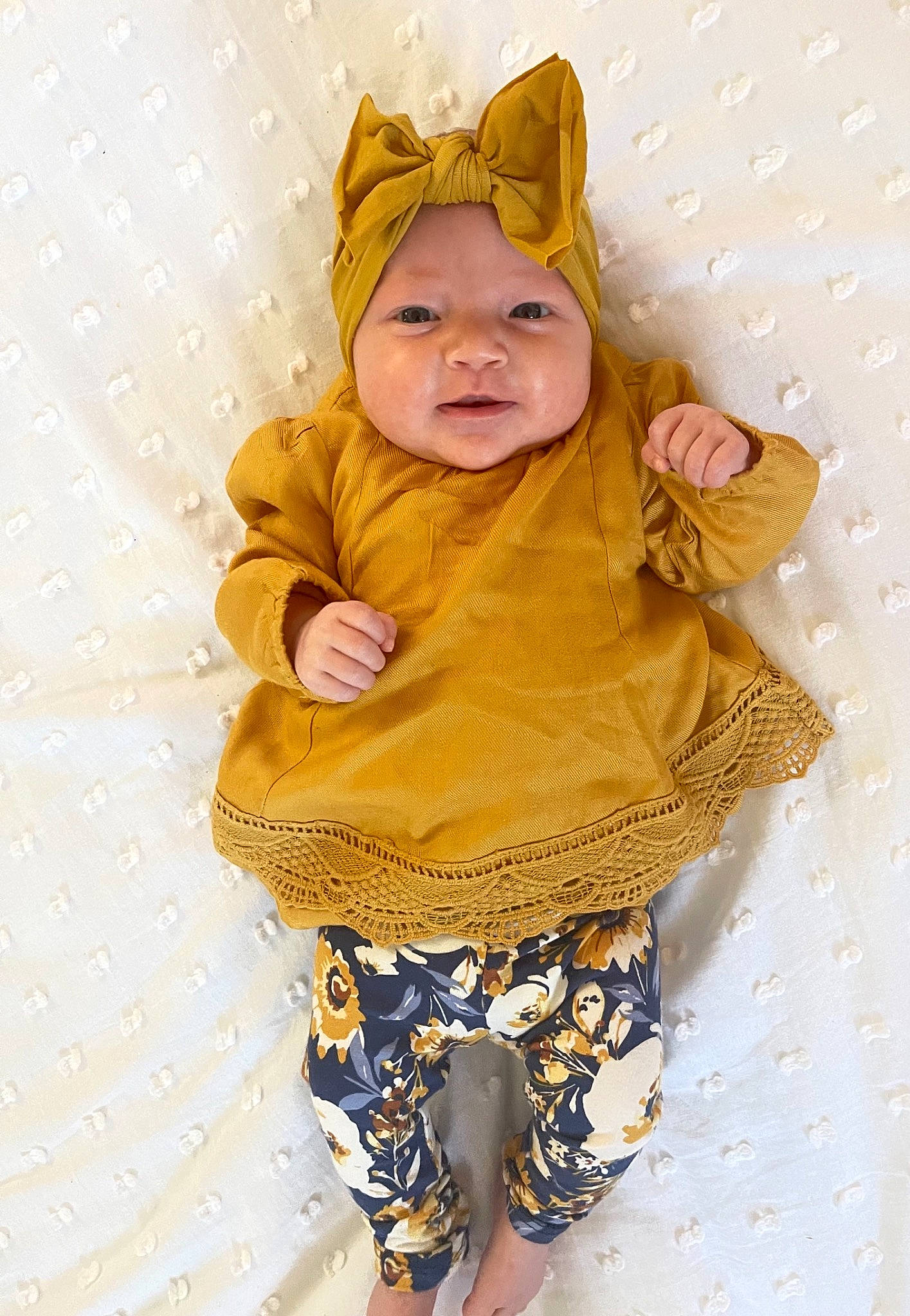 Lula joined the competition — help win amazing prizes! baby, baby_products, baby_toddler_clothing, child, costume, costume_hat, eye, fashion_accessory, happy, head, headgear, headwear, human_body, linens, magenta, pattern, peach, person, sleeve, smile