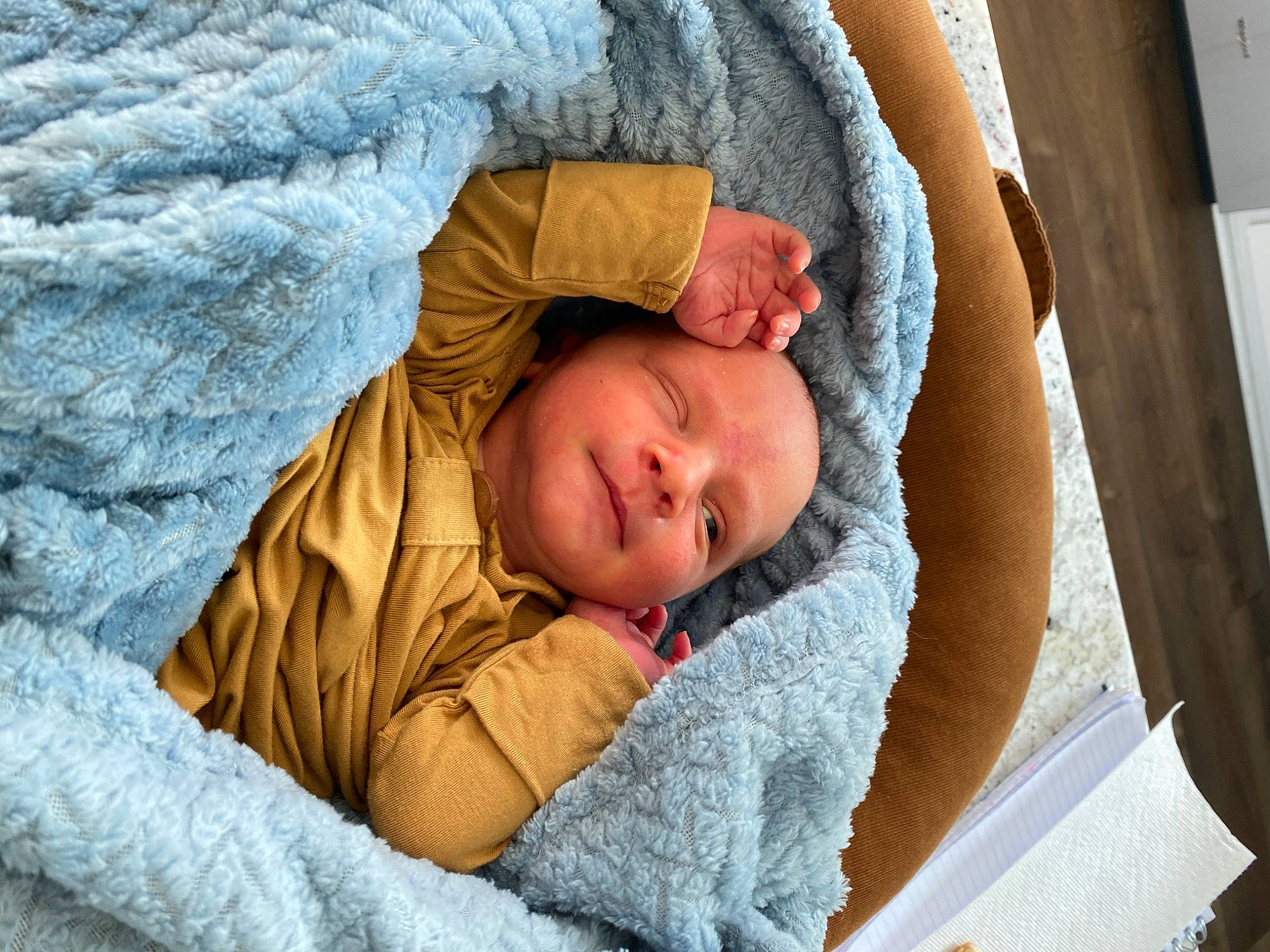 Reed is registered to the contest to win money with this photo: baby, baby_products, baby_sleeping, bedding, bedtime, blanket, child, comfort, couch, fur, grass, headwear, human_body, linens, nap, person, room, sitting, skin, toddler