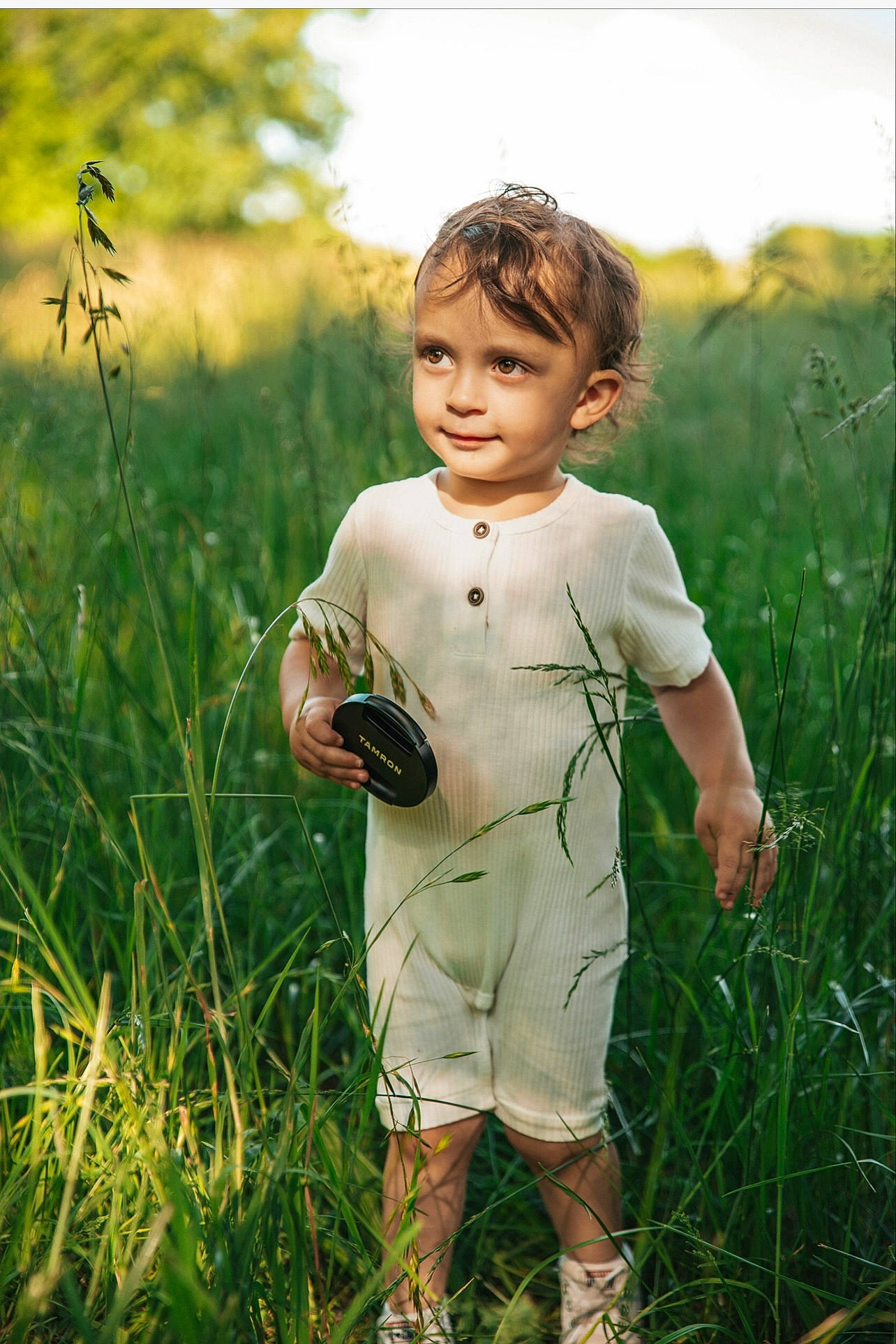 Remington joined the competition — help win amazing prizes! baby_toddler_clothing, child, field, flash_photography, fun, gesture, grass, grassland, happy, landscape, meadow, pattern, people_in_nature, person, plant, prairie, sky, sleeve, terrestrial_plant, toddler