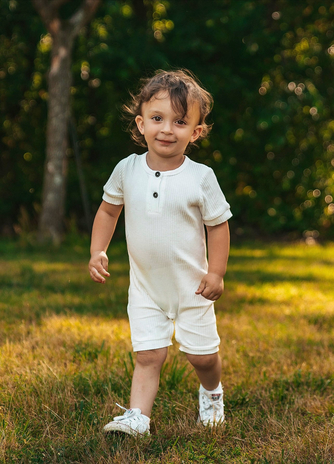 Remington is registered to the contest to win money with this photo: ball, blond, child, flash_photography, fun, gesture, grass, grassland, happy, joy, lawn, leisure, meadow, people_in_nature, person, plant, recreation, shorts, t_shirt, toddler