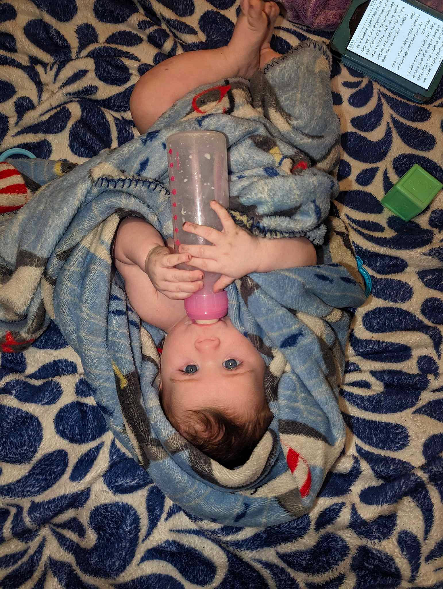Chandler is registered to the contest to win money with this photo: abdomen, arm, baby, baby_products, baby_toddler_clothing, blue, cheek, chest, comfort, foot, happy, human_body, human_leg, linens, pattern, person, stomach, thigh, toddler, toy