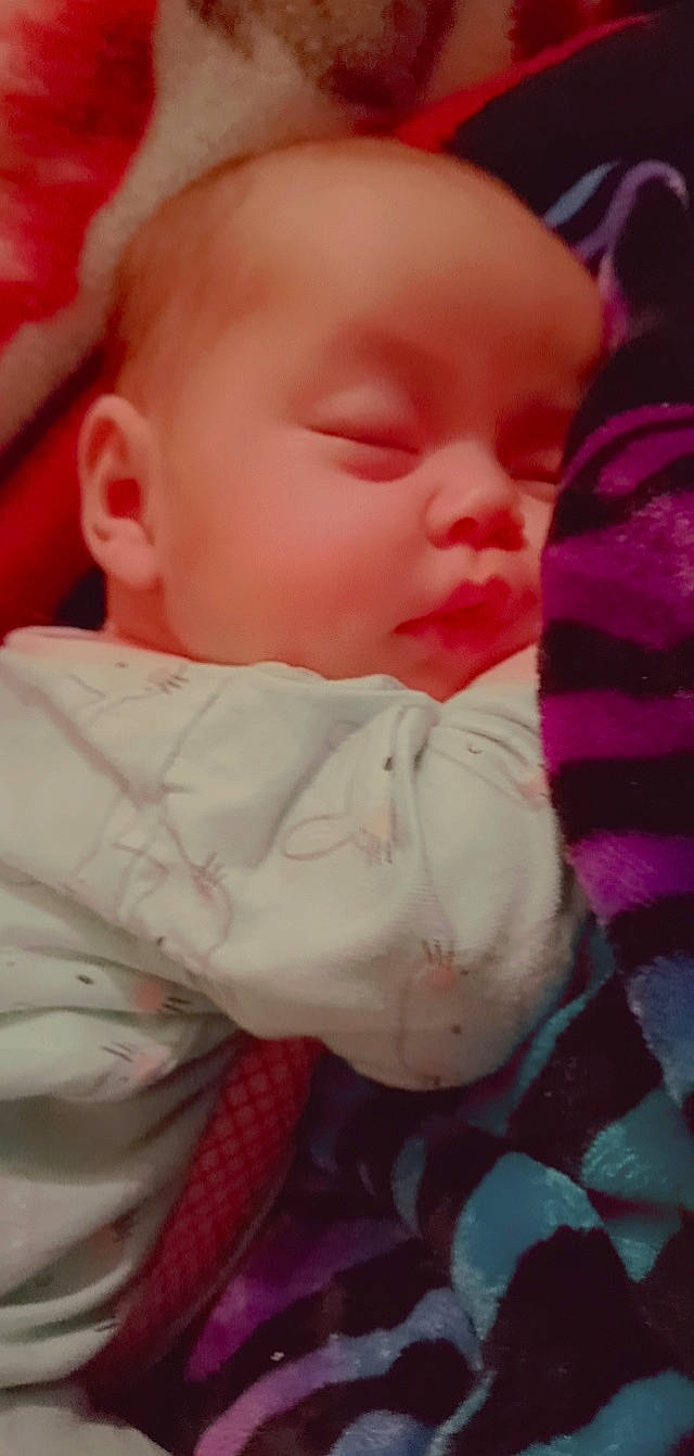 Abriella is registered to the contest to win money with this photo: baby, baby_toddler_clothing, bedtime, carmine, cheek, child, comfort, eyelash, flesh, grass, happy, iris, linens, lip, nose, pattern, person, pink, portrait_photography, skin