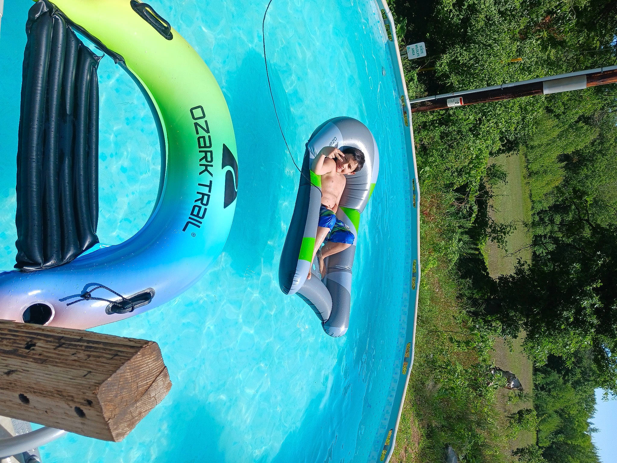 Charlie joined the competition — help win amazing prizes! aqua, azure, blue, boats_and_boating_equipment_and_supplies, chute, electric_blue, font, fun, games, green, joy, leisure, nature, nonbuilding_structure, outdoor_play_equipment, outdoor_recreation, person, personal_protective_equipment, recreation, summer