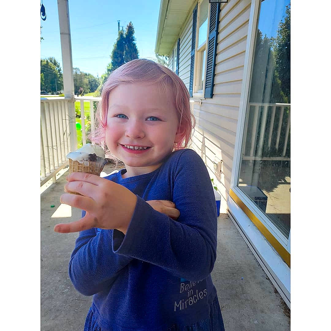 Aurora joined the competition — help win amazing prizes! arm, baby_toddler_clothing, child, electric_blue, fun, gesture, grass, happy, house, joy, leisure, person, skin, sky, sleeve, smile, standing, t_shirt, thumb, toddler