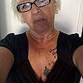 Claudine M.