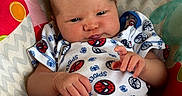 Hope joined the competition — help win amazing prizes! baby, infant, child, portrait, lying_down, spiderman, onesie, colorful, blanket, play_mat, face, hands, legs, eyes, indoors, close_up, patterned, textile, happy, adorable