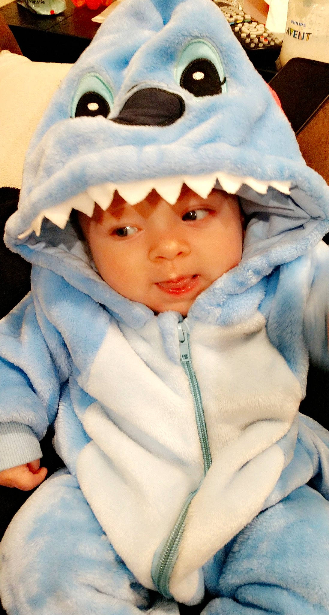 Damien is registered to the contest to win money with this photo: baby, blue, child, headgear, headwear, hood, outerwear, person, toddler