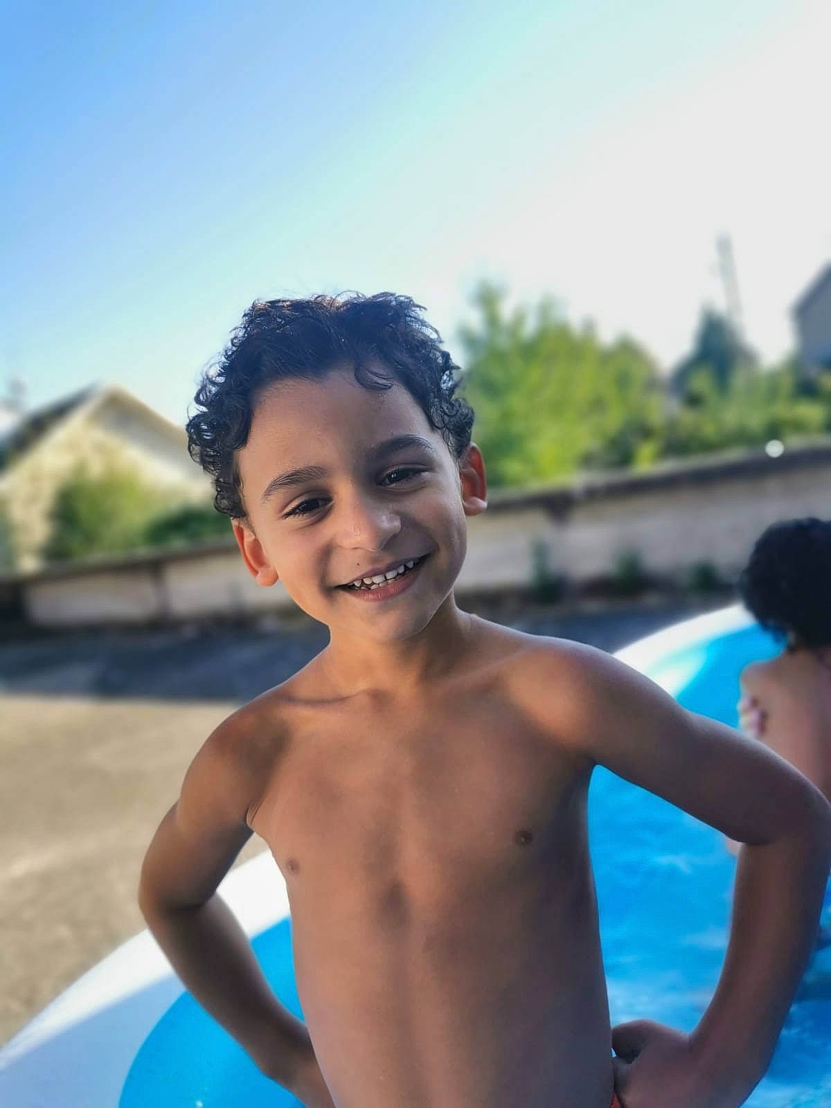 Camron participe au concours pour gagner de l'argent avec cette photo : barechested, chest, child, cool, facial_expression, fun, happy, joy, leisure, muscle, person, photography, play, recreation, shoulder, smile, summer, sunlight, swimming_pool, vacation