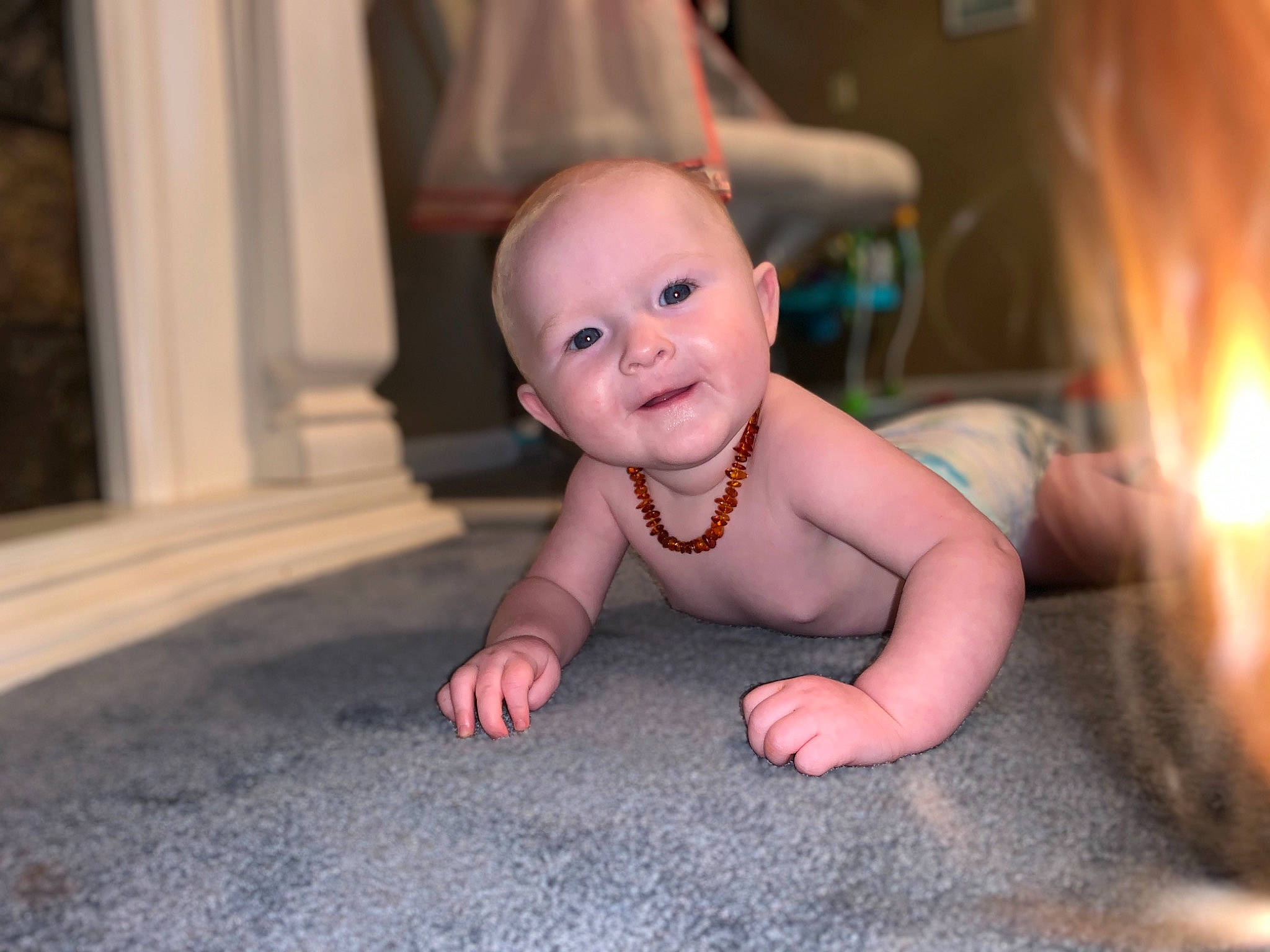 Isabella is registered to the contest to win money with this photo: baby, cheek, child, eye, face, facial_expression, fun, person, photography, sitting, skin, smile, toddler, vacation