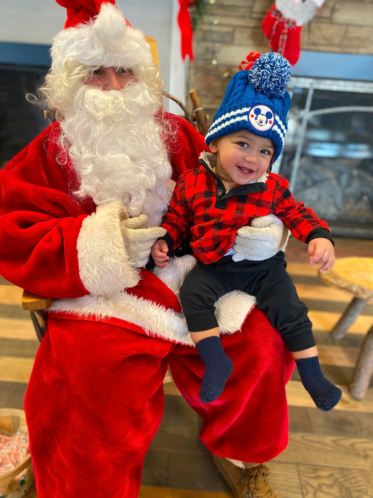 Jeremiah is registered to the contest to win money with this photo: beard, christmas, christmas_eve, costume_hat, event, fictional_character, fun, glove, happy, hat, headwear, holiday, joy, lap, mammal, person, plant, recreation, red, santa_claus