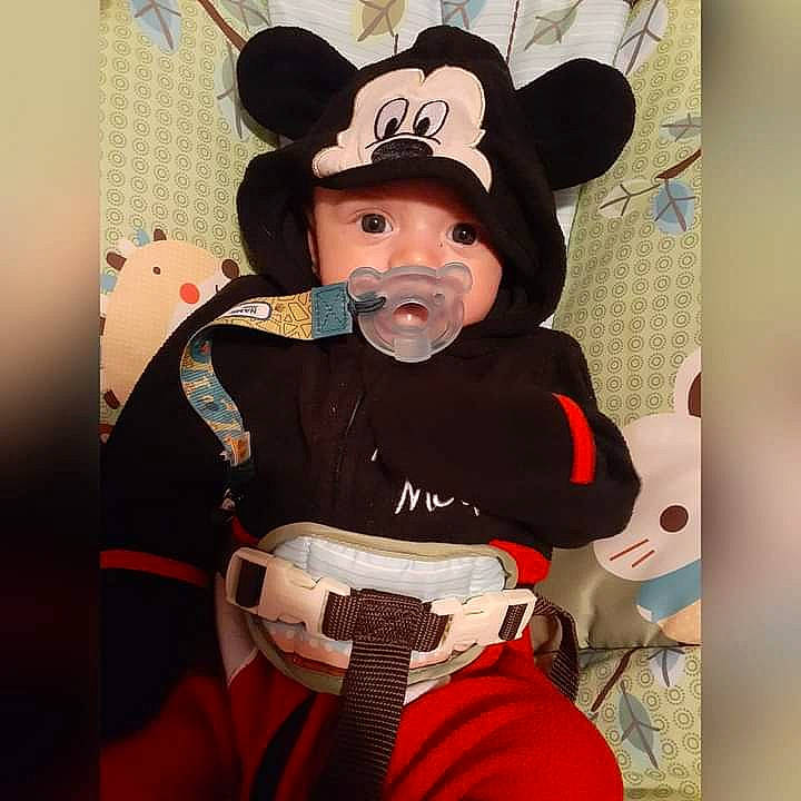 Jeffrey is registered to the contest to win money with this photo: baby, baby_toddler_clothing, beard, carmine, child, costume, costume_accessory, costume_hat, cowboy_hat, eye, fictional_character, fur, gesture, happy, hat, headgear, headwear, moustache, person, personal_protective_equipment