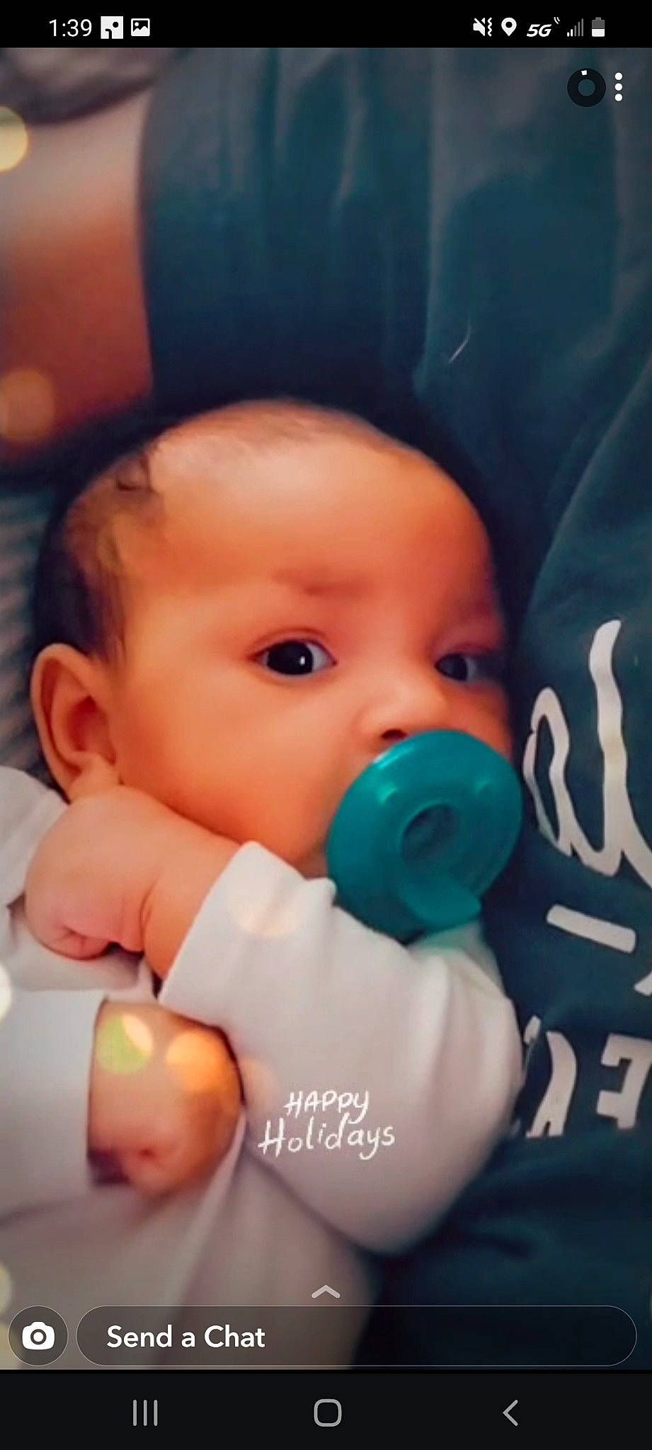 Faye is registered to the contest to win money with this photo: baby, cap, cheek, child, eyebrow, eyelash, finger, fun, gesture, hand, happy, lip, mouth, nail, nose, person, skin, smile, thumb, toddler