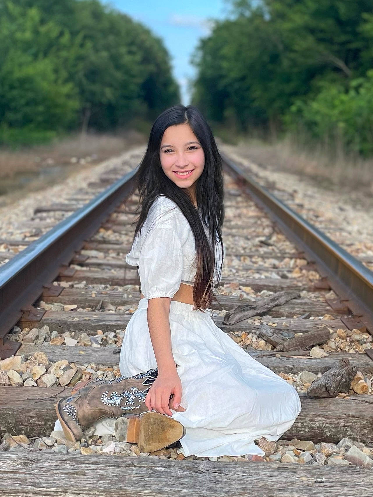 Audriana is registered to the contest to win money with this photo: black_hair, dress, eye, face, flash_photography, grass, happy, joy, leisure, long_hair, nature, people_in_nature, person, skin, sky, smile, summer, thigh, track, travel