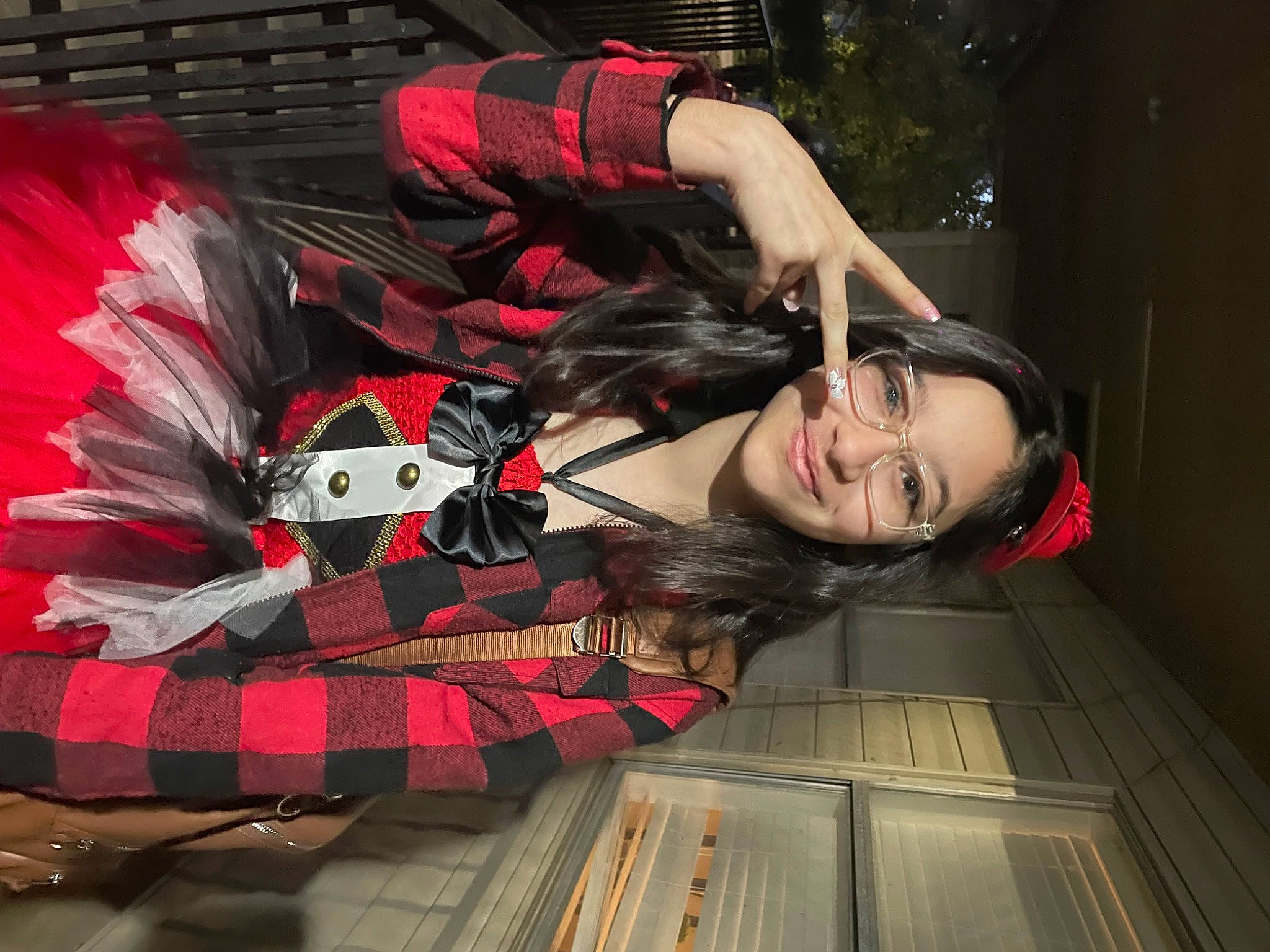 Audriana is registered to the contest to win money with this photo: black_hair, cool, dress, eyewear, fashion, flash_photography, hair, hime_cut, human_leg, joy, long_hair, pattern, person, plaid, plant, red, red_hair, smile, tartan, thigh