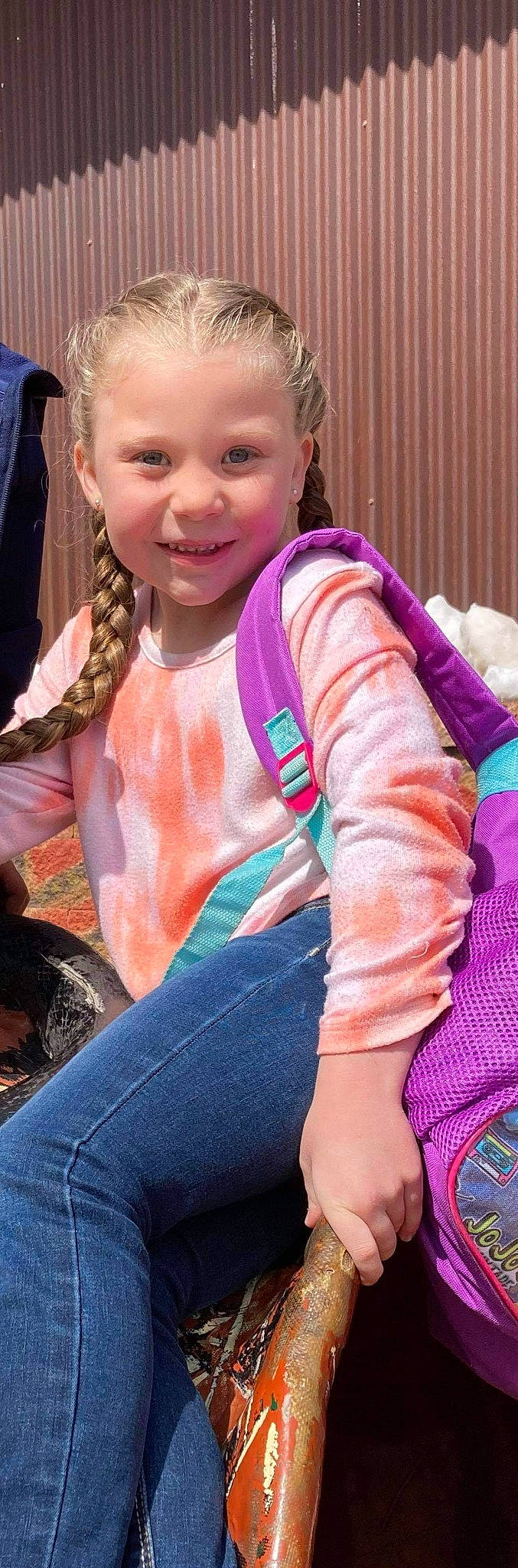 Delaney is registered to the contest to win money with this photo: baby_toddler_clothing, child, clothing, cool, facial_expression, finger, gesture, hairstyle, hand, happy, iris, joy, lip, mouth, neck, person, pink, skin, sleeve, smile