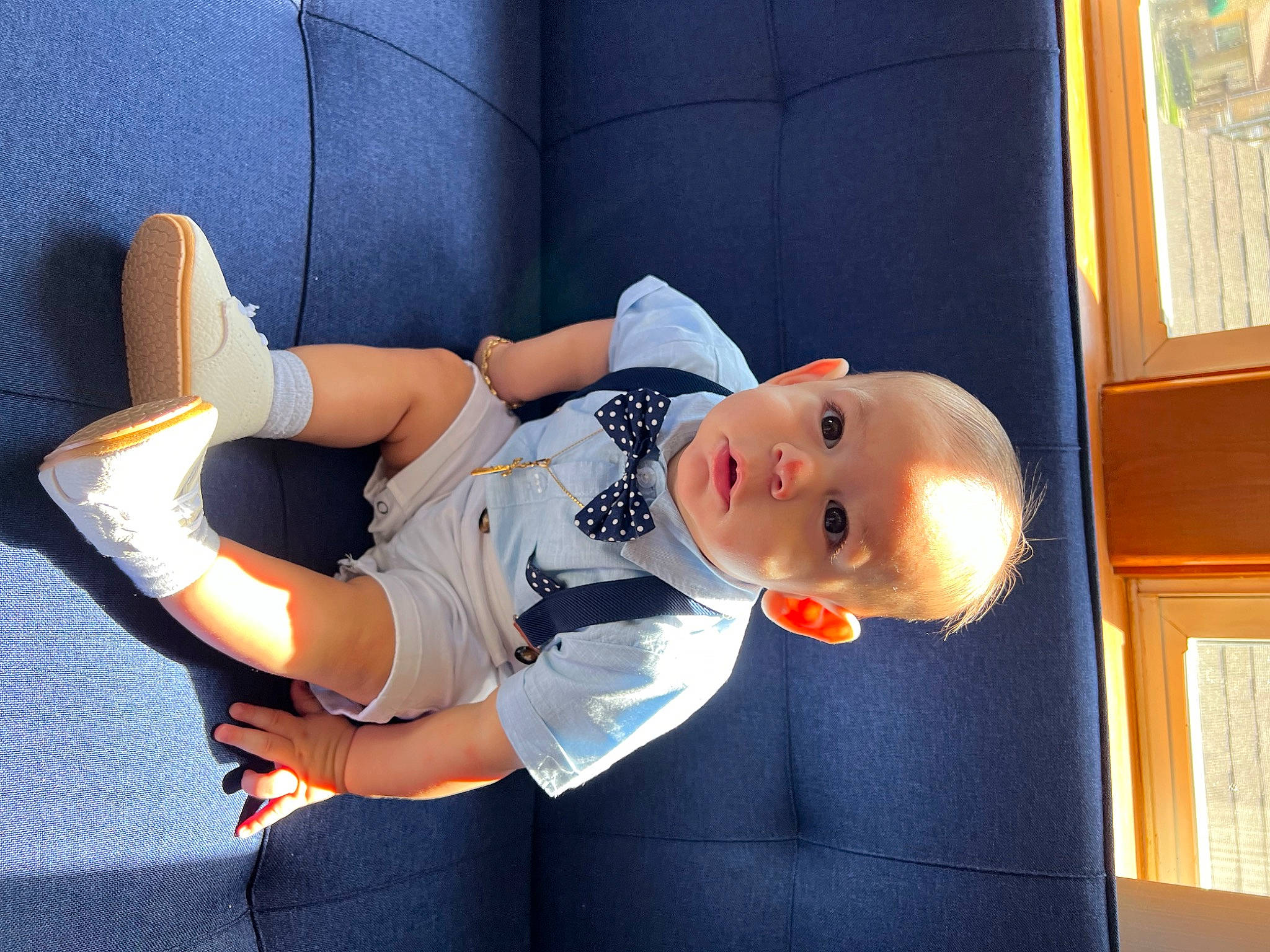 Alessandro Cristiano is registered to the contest to win money with this photo: baby, baby_products, baby_toddler_clothing, child, comfort, elbow, fun, gesture, happy, hat, human_leg, knee, person, room, sitting, sleeve, smile, sportswear, thigh, thumb