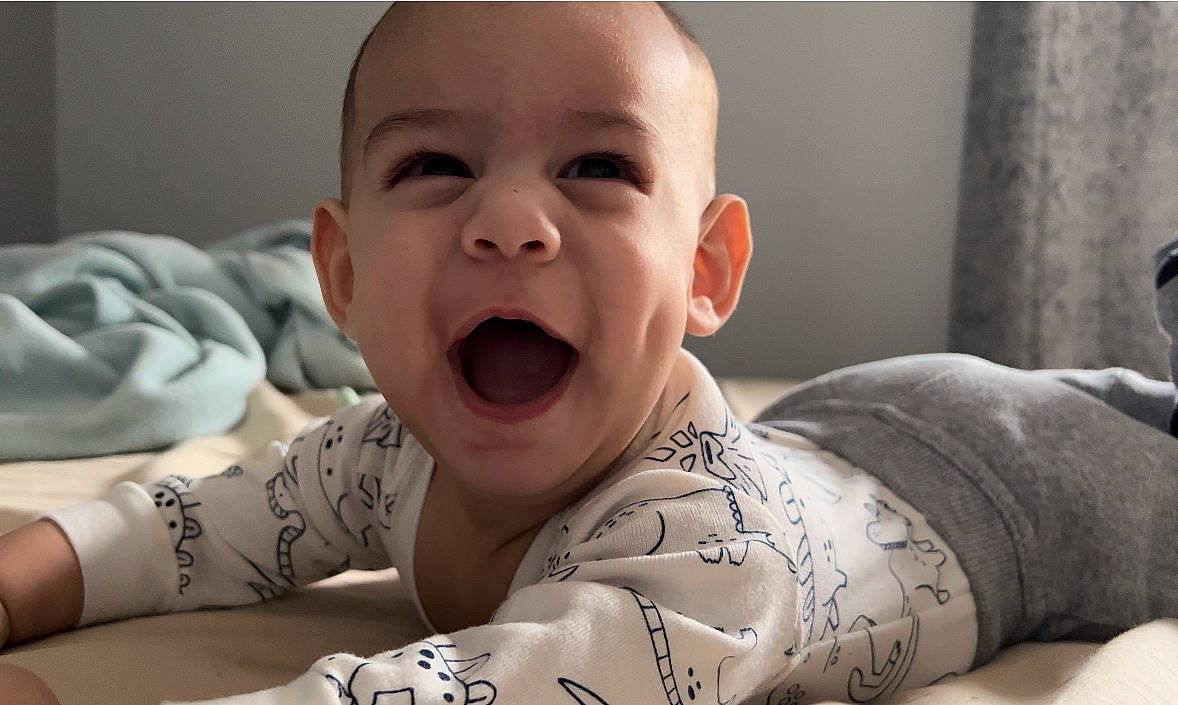 Alessandro Cristiano is registered to the contest to win money with this photo: baby, cheek, chin, comfort, eye, eyebrow, gesture, human_body, jaw, leg, lip, mouth, muscle, neck, nose, organ, person, skin, sleeve, smile