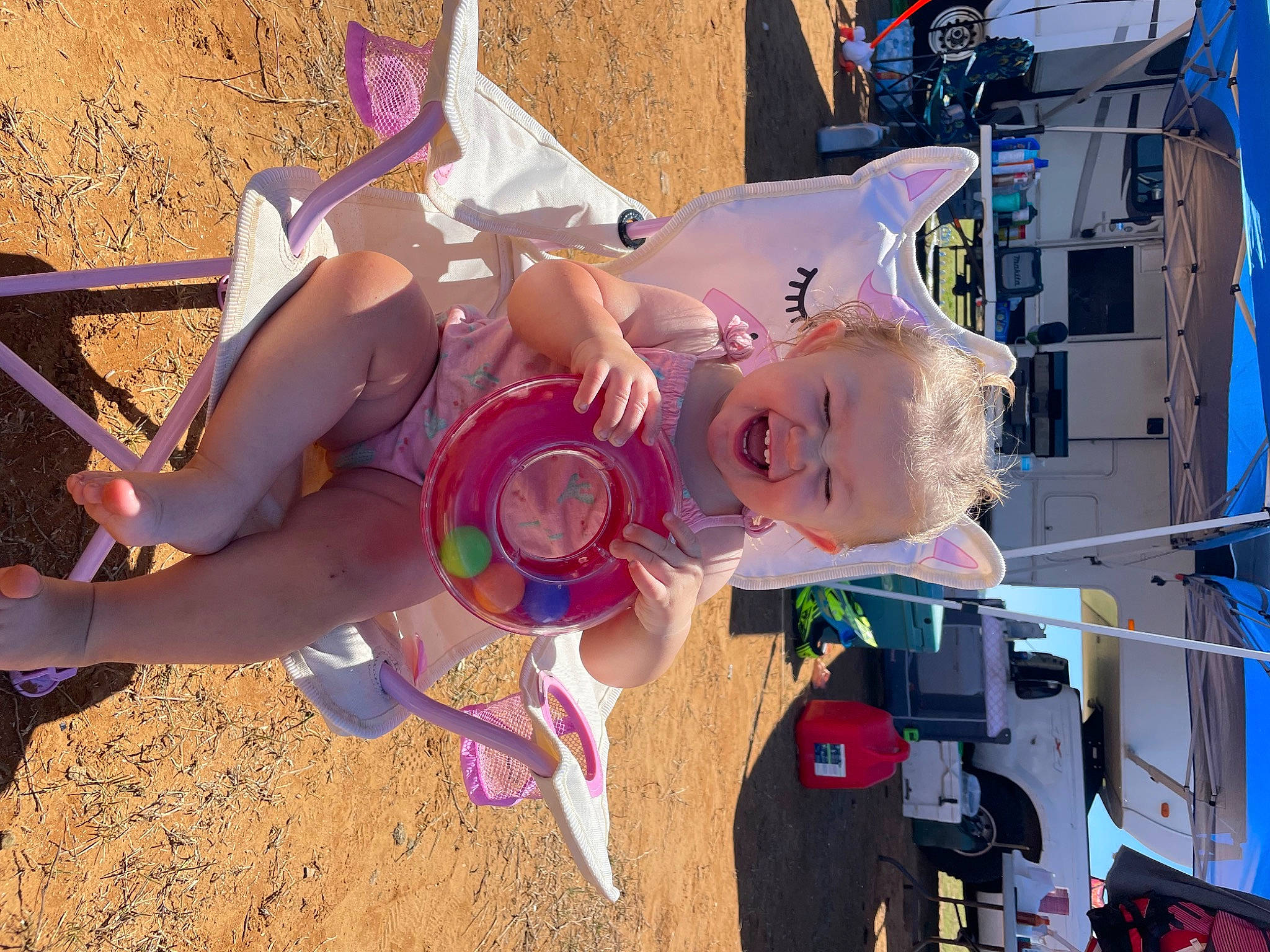 Haylee joined the competition — help win amazing prizes! baby, car, fun, hat, human_leg, leisure, motor_vehicle, person, public_event, recreation, soil, thigh, tire, toddler, toy, vehicle, wheel