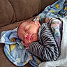 Dallas joined the competition — help win amazing prizes! newborn, baby, sleeping, infant, portrait, face, couch, blanket, swaddle, striped_clothing, pacifier, peaceful, indoors, cozy, soft_blanket, brown_couch, resting, closed_eyes, head, home