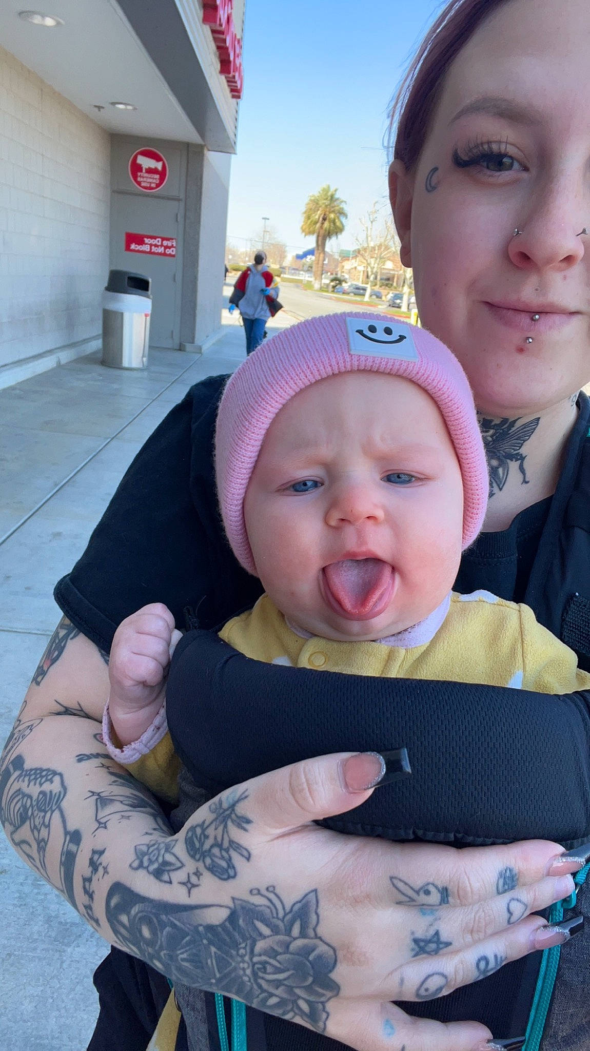 Harlee is registered to the contest to win money with this photo: baby, blue, cheek, cool, eye, face, happy, hat, head, headgear, headwear, joy, lip, mouth, person, photograph, pink, skin, sleeve, smile