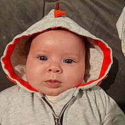 Lila joined the competition — help win amazing prizes! baby, hood, jacket, face, infant, cute, child, clothing, portrait, baby_bottle, fabric, soft, indoor, eyes, young, zipper, person, warm, sleepwear, cozy