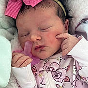 Miyah is registered to the contest to win money with this photo: newborn, baby, sleeping, pacifier, pink_bow, onesie, floral_pattern, blanket, infant, cute, peaceful, hand, face, headband, soft, closeup, indoors, child, newborn_baby, portrait