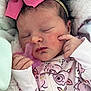 newborn, baby, sleeping, pacifier, pink_bow, onesie, floral_pattern, blanket, infant, cute, peaceful, hand, face, headband, soft, closeup, indoors, child, newborn_baby, portrait