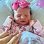 Miyah joined the competition — help win amazing prizes! newborn, baby, sleeping, pink_bow, headband, pajamas, hand, blanket, pacifier, bed, infant, closeup, soft_lighting, peaceful, cute, portrait, indoors, child, resting, baby_clothes