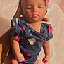 Yanni is registered to the contest to win money with this photo: baby, infant, child, pink_bow, navy_outfit, floral_pattern, hand_holding, soft_blanket, heart_pattern, cute, adorable, portrait, newborn, sleepy, indoor, closeup, headband, small_hands, skin, gentle