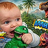 baby, child, dinosaur_toy, green_toy, prehistoric_jungle, t_rex, cartoon_dinosaurs, comic_text, chomp_text, aaah_text, volcano, palm_trees, roaring_dinosaur, cute_baby, chewing, playful, toy, fantasy_background, colorful, smiling