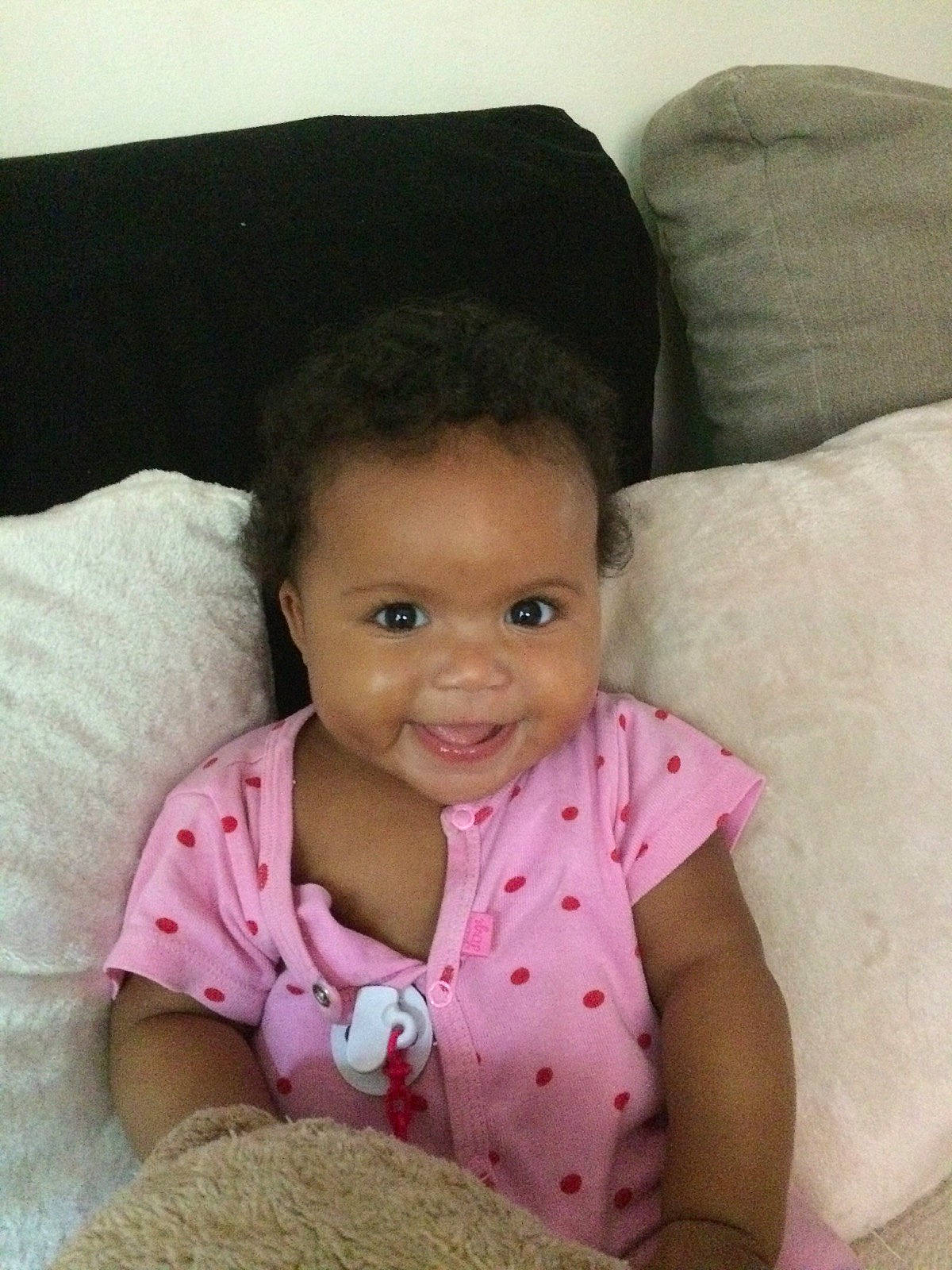 Shanel participe au concours pour gagner de l'argent avec cette photo : bedtime, black_hair, cheek, child, day, ear, eye, finger, girl, head, infant, iris, joy, lip, mouth, nose, person, pink, product, skin