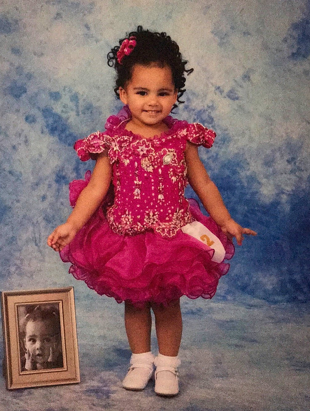 Elizabeth joined the competition — help win amazing prizes! baby, baby_toddler_clothing, child, child_model, clothing, costume, dress, hair_accessory, joy, magenta, pattern, person, photography, pink, ruffle, smile, toddler