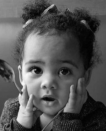 Elizabeth is registered to the contest to win money with this photo: black, black_and_white, cheek, child, chin, eye, eyebrow, face, facial_expression, forehead, hair, hairstyle, head, lip, monochrome, monochrome_photography, nose, person, photograph, photography