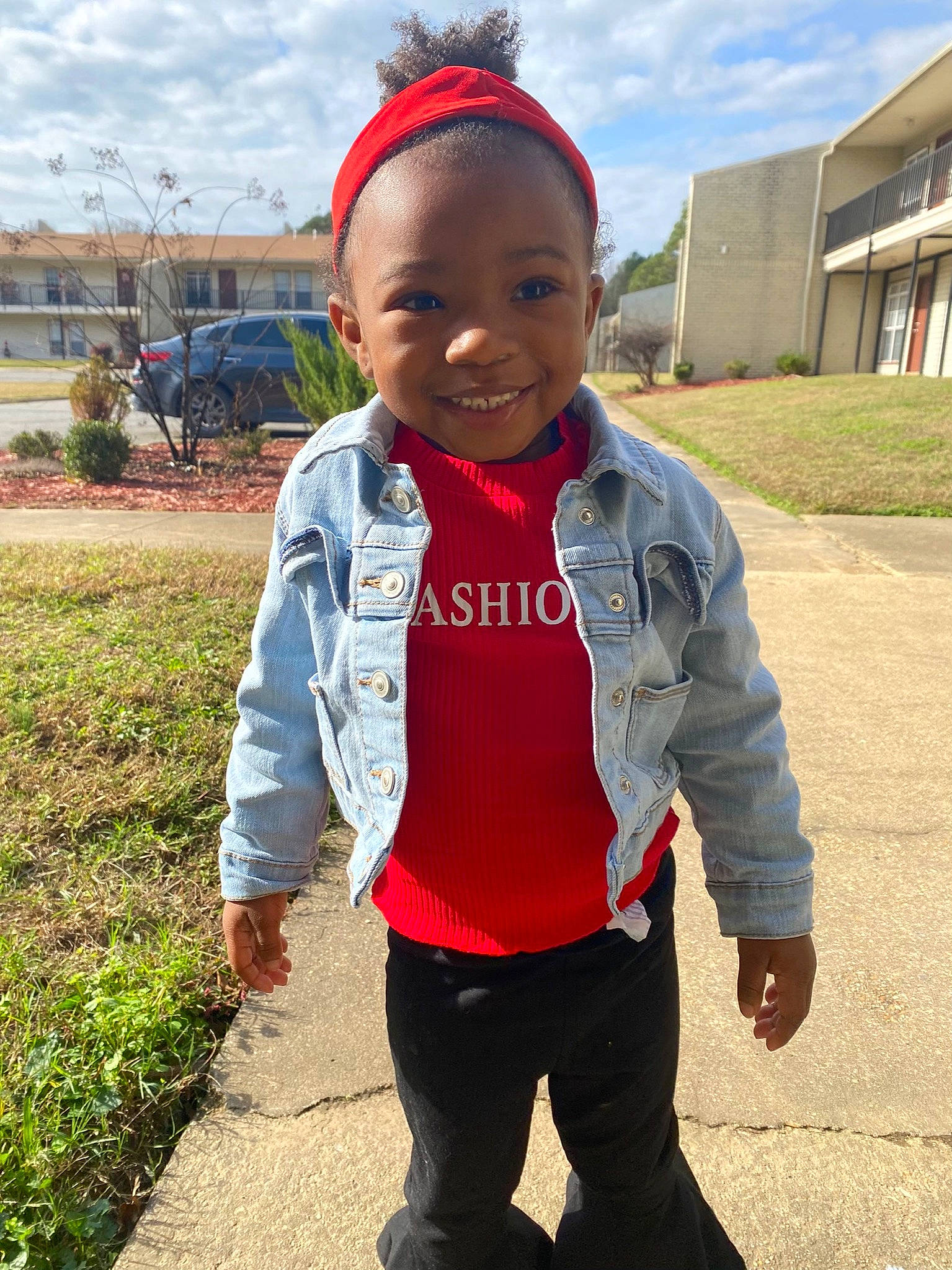 Kahlilia is registered to the contest to win money with this photo: cloud, electric_blue, face, fun, gesture, grass, hair, happy, headgear, joy, landscape, leisure, neck, person, personal_protective_equipment, plant, recreation, sky, sleeve, smile