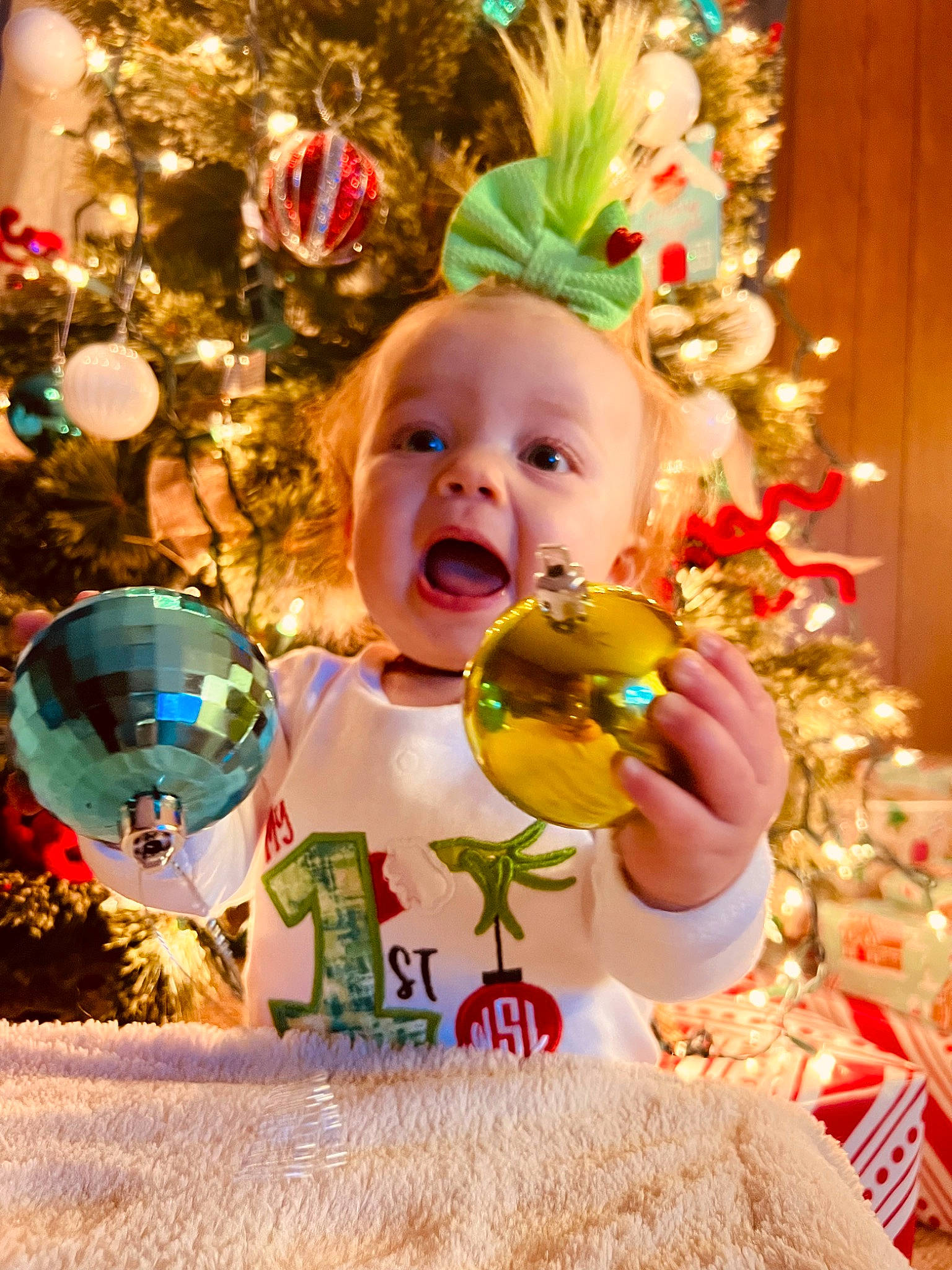 Wrenlee joined the competition — help win amazing prizes! baby, baby_toddler_clothing, cheek, child, christmas, christmas_decoration, christmas_eve, christmas_ornament, christmas_tree, conifer, event, fun, happy, holiday, holiday_ornament, ornament, person, plant, smile, toddler